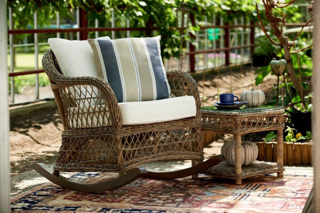 Add some pastel colored pillows to your wicker garden furniture